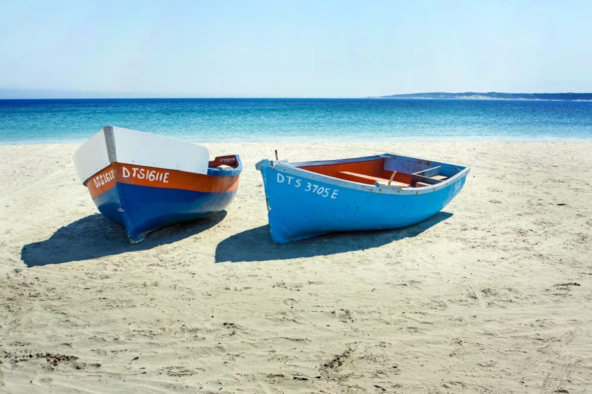 boats on the beach in paternoster, west coast of south africa